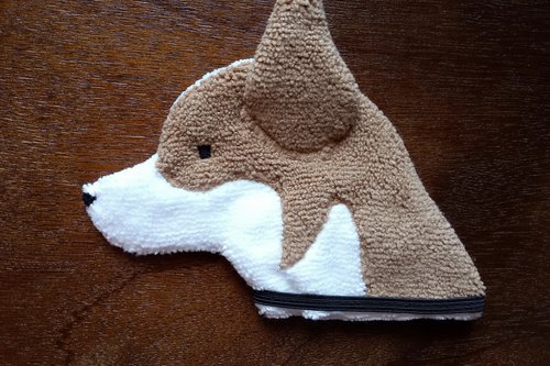 Soft, microfiber terry cloth towels cut, sewn, and made in the shape of a dog