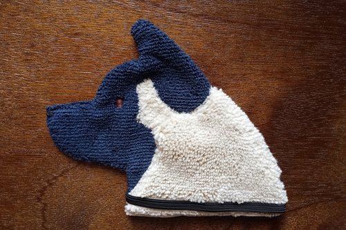 American Akita shaped cleaning and polishing cloth.