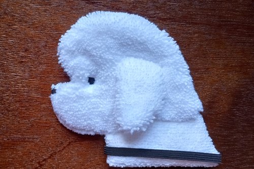 Soft, microfiber terry cloth towels cut, sewn, and made in the shape of a dog