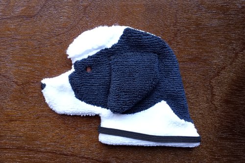 Soft, microfiber terry cloth towels cut, sewn, and made in the shape of a dog