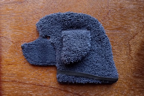 Soft, microfiber terry cloth towels cut, sewn, and made in the shape of a dog