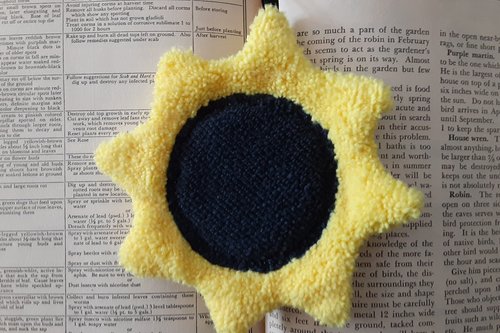 Microfiber shaped towel that looks like a Sunflower.