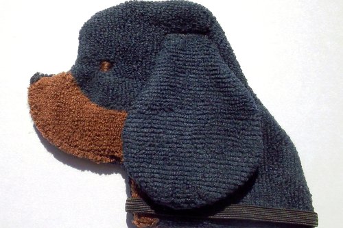 Soft, microfiber terry cloth towels cut, sewn, and made in the shape of a dog