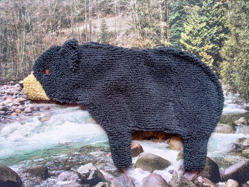 Soft, microfiber terry cloth towels  made in the shape of a Black Bear.
