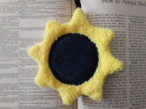 Microfiber shaped towel that looks like a Sunflower.